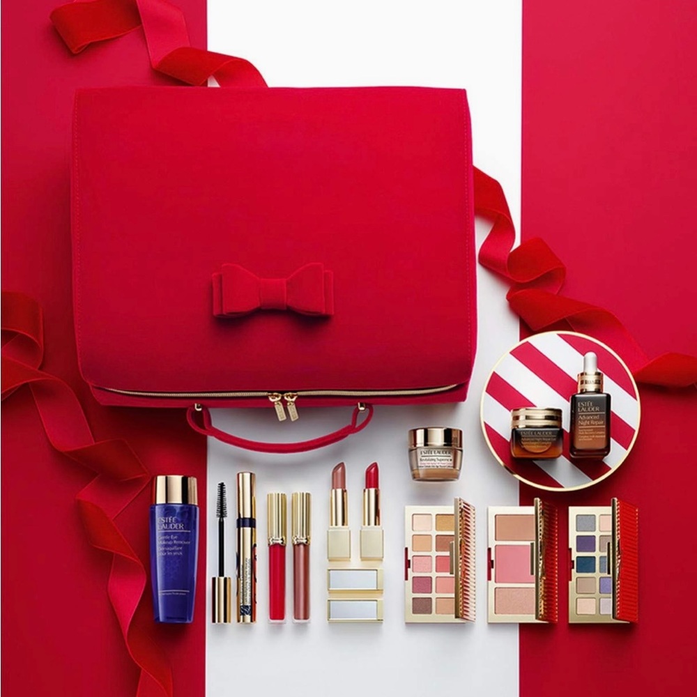 Beautiful Este Lauder set with velvet red and gold makeup bag